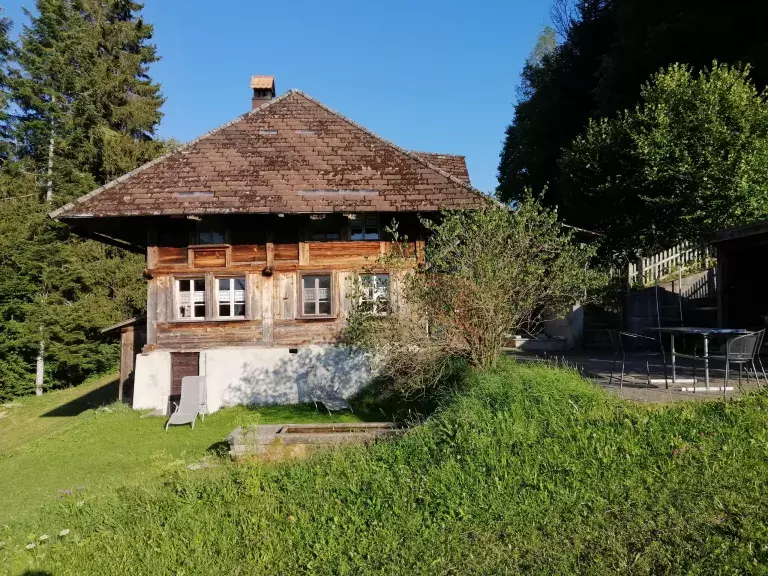 Ferienhaus mit Sitzplatz und Brunnen